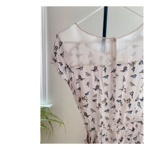 Bird prints with side pockets dress